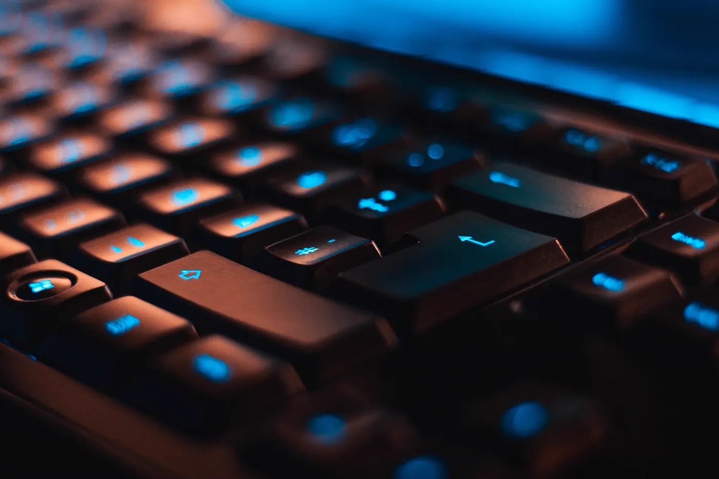 Close-up of a backlit mechanical gaming keyboard